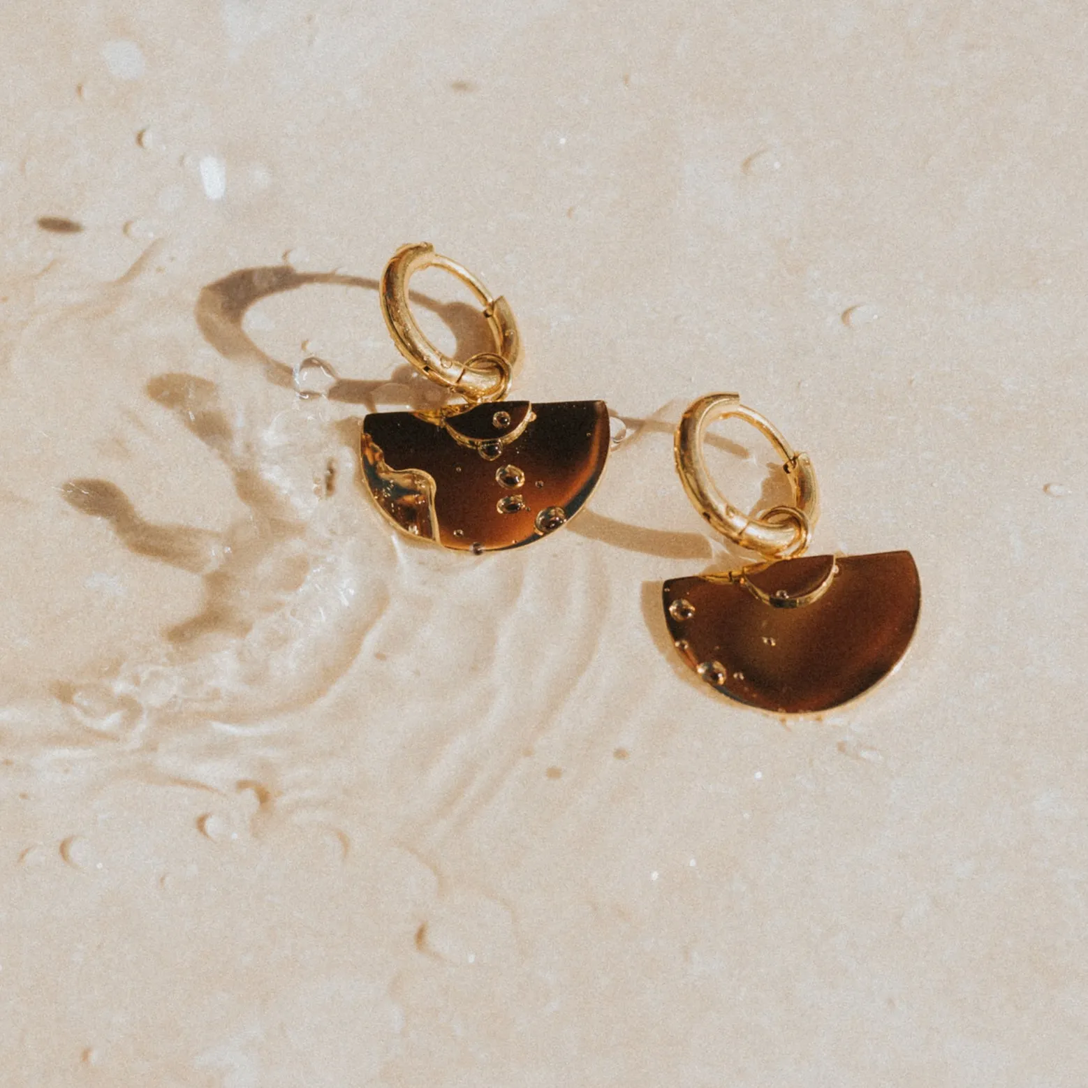 SUNRISE SURF EARRINGS 18K GOLD